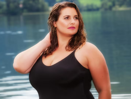 Plus-size man sitting comfortably outdoors